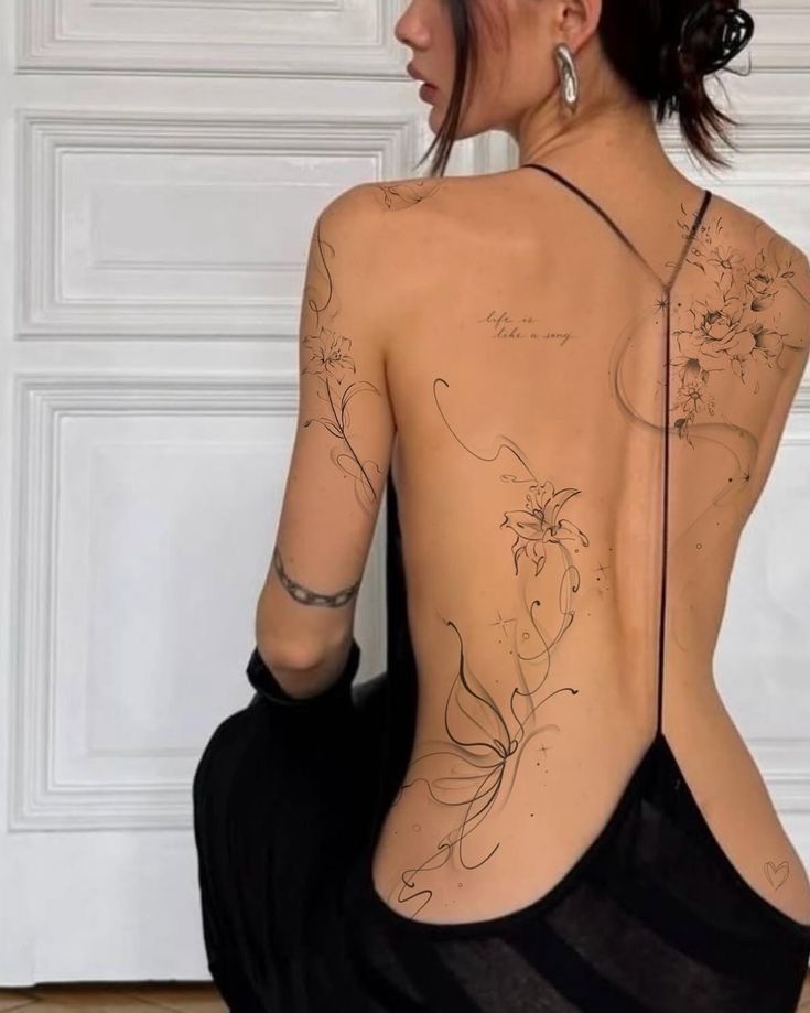 Tatouage dos femme 12