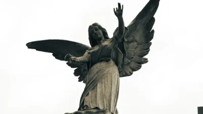 a statue of an angel with outstretched wings