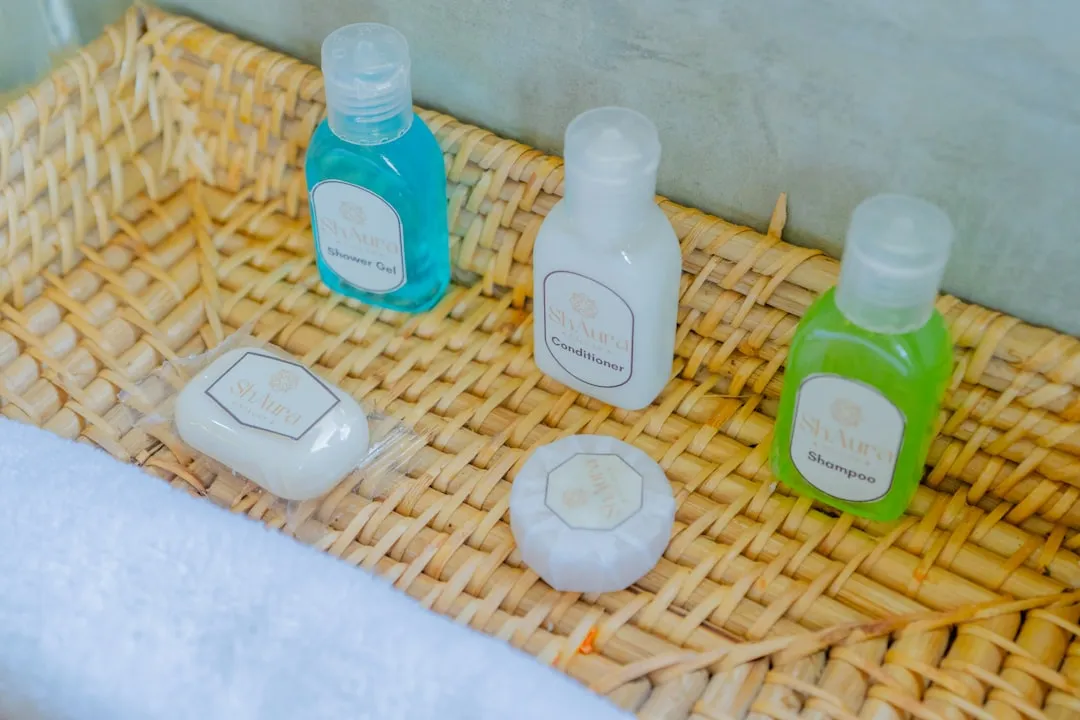 Bath products are neatly arranged in a woven basket.