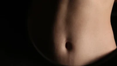 A close-up of a person's abdomen.