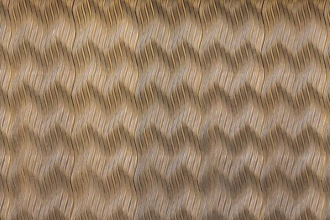 white and black textile on brown textile