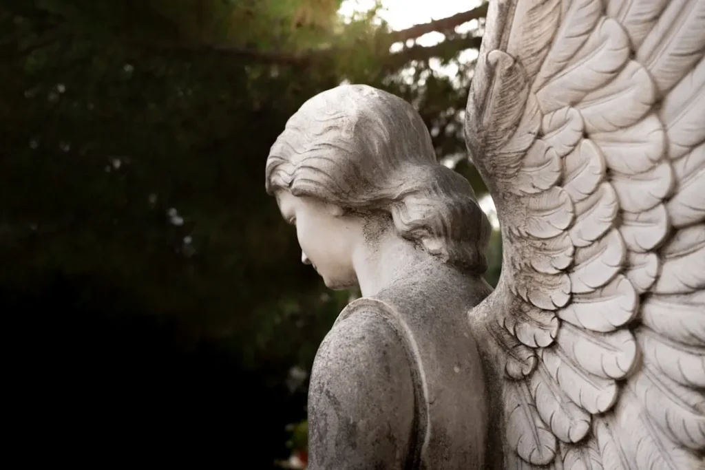 A close up of a statue of an angel