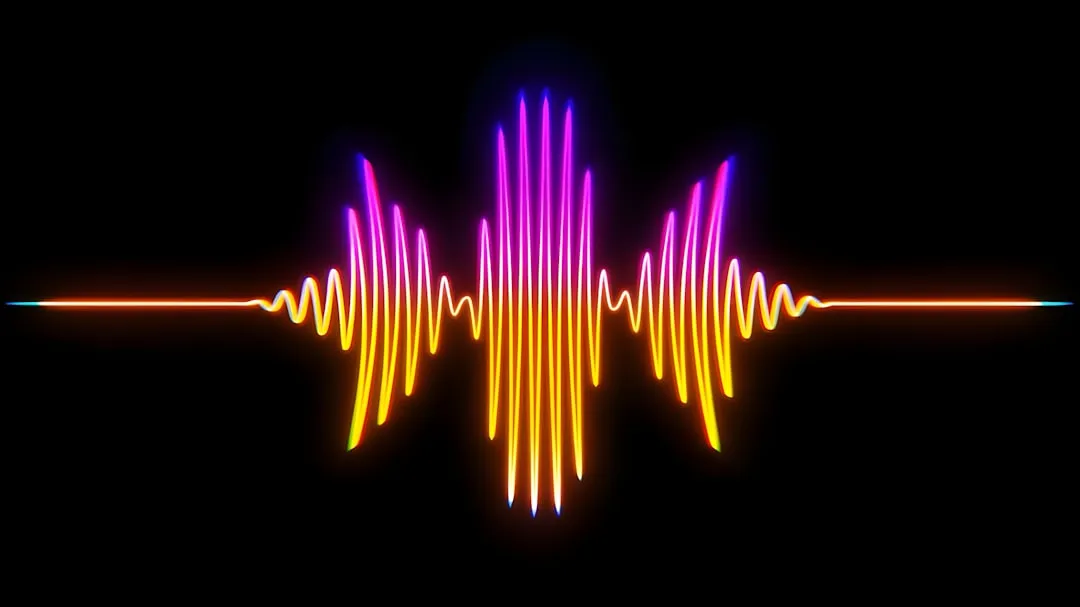 A colorful sound wave on a black background