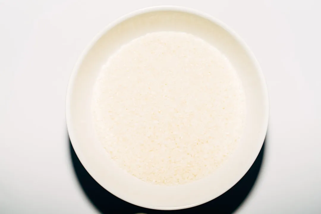 a white bowl with a white substance
