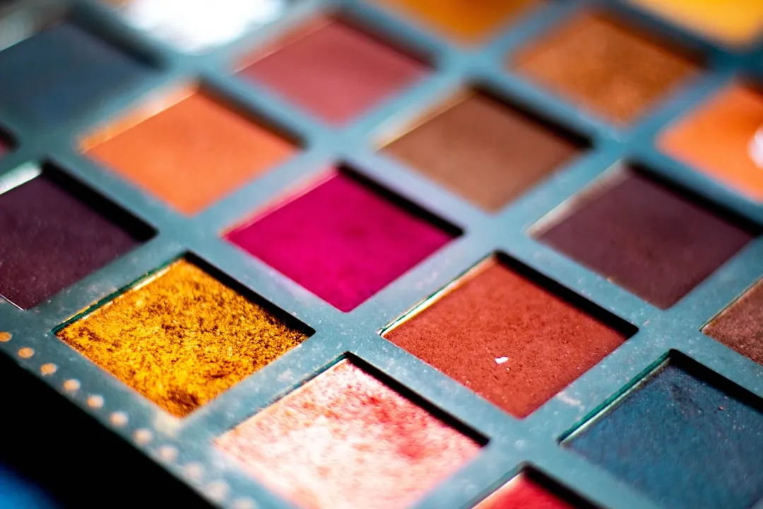a close up of a colorful makeup palette