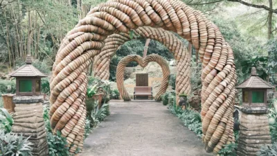 A path with a heart shaped entrance to a garden