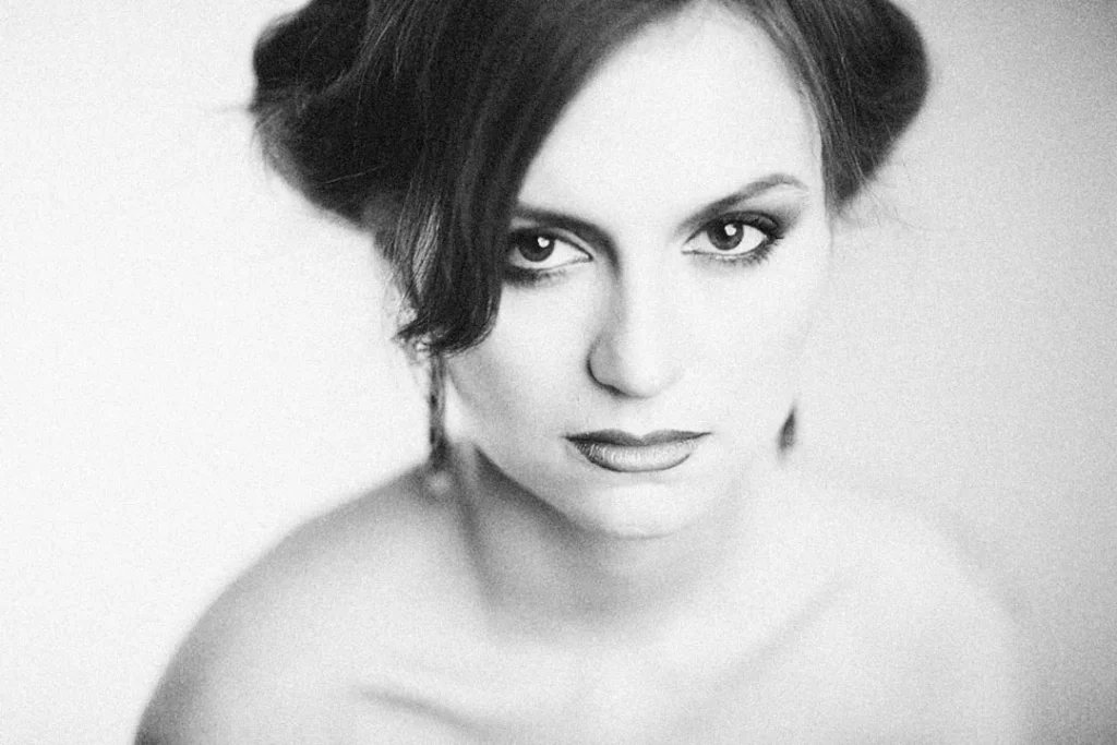 a black and white photo of a woman's face