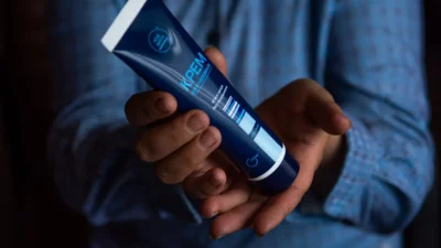 blue and white plastic tube bottle